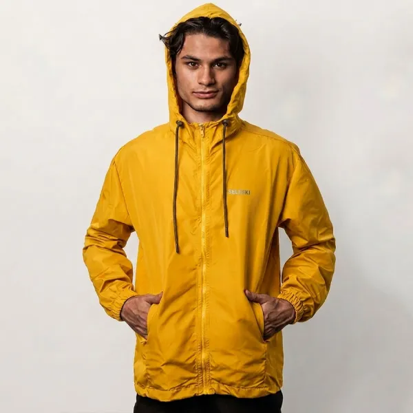 Cortavientos Amarillo Caterpila
